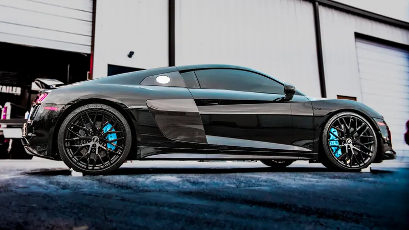 Black Audi R8 V10 with carbon sideblades after a full detail