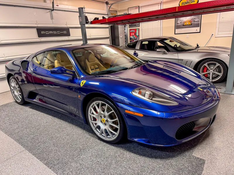 Blue Ferrari F430 with deep gloss after paint correction and ceramic coating